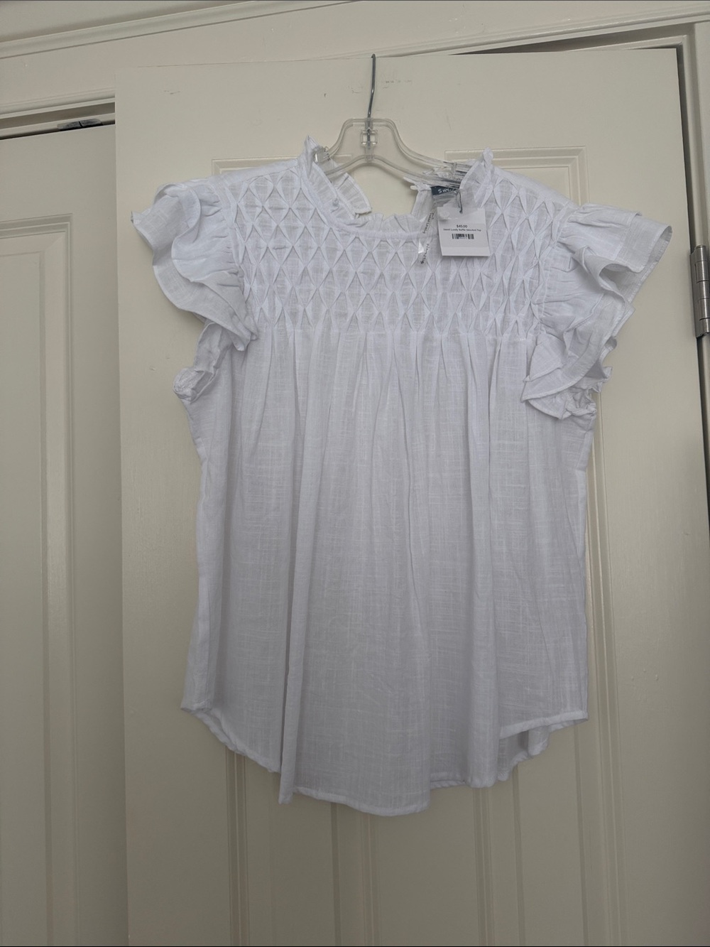 White Smocked Ruffle Sleeve Blouse